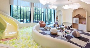 Children’s area - Cozy 1-bedroom apartment with AC in beautiful Tambon Choeng Thale (Tambon Choeng Thale)