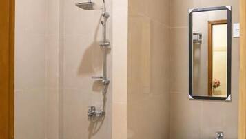 Shower, free toiletries, towels, toilet paper