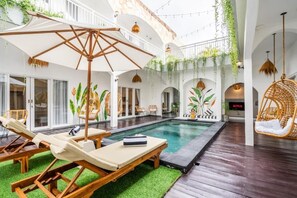 Basic Studio, Balcony, Courtyard View | Pool | Outdoor pool - Azure Suites (Canggu)