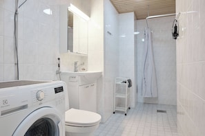 Standard Apartment, Courtyard View | Bathroom | Shower, hair dryer, towels, soap - Bright 1BR Apt with Sauna & Balcony (Raisio)