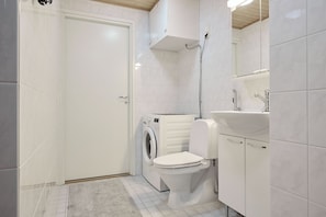 Standard Apartment, Courtyard View | Bathroom | Shower, hair dryer, towels, soap - Bright 1BR Apt with Sauna & Balcony (Raisio)