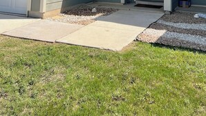 A two-story house with a garage, a front door, and a small porch area. - [HB102] New 3BR near JBSA, Randolph Airforce Base I Fully Stocked + Parking (San Antonio)