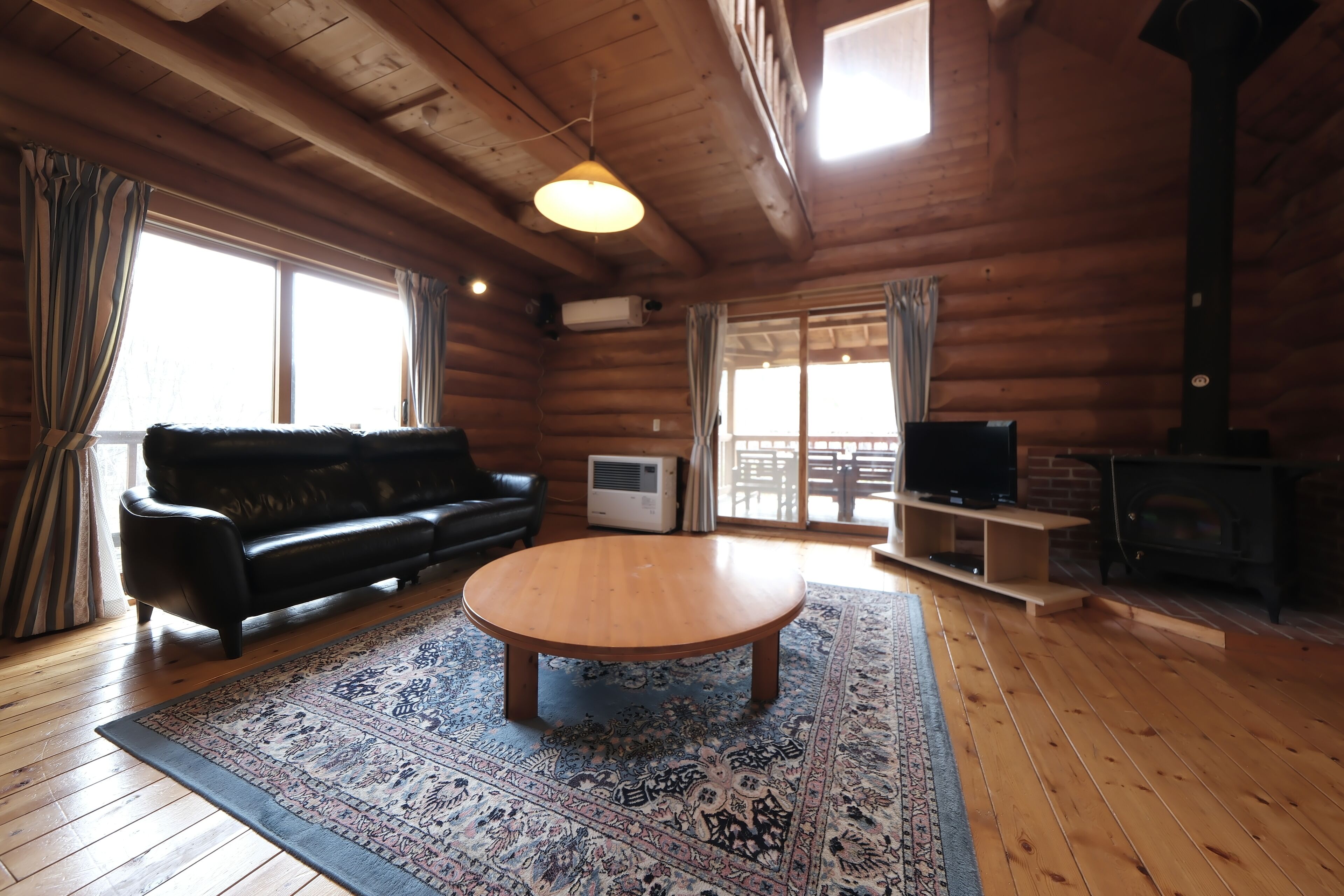 Villa, Multiple Beds | Living area | 40-inch TV with digital channels
