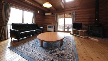 Villa, Multiple Beds | Living area | 40-inch TV with digital channels