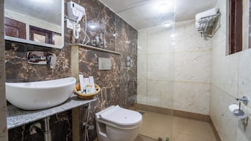Shower, free toiletries, hair dryer, slippers