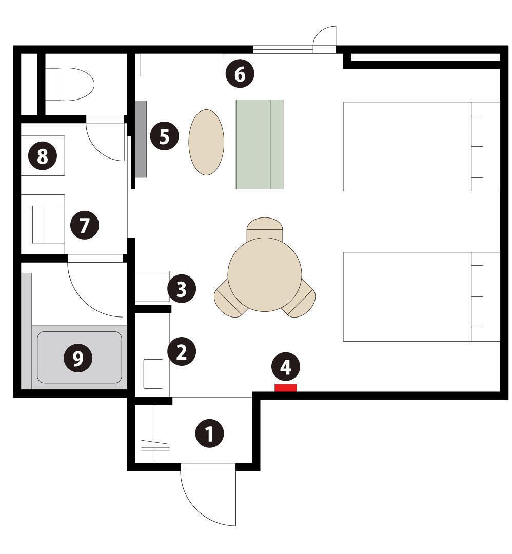 A floor plan with numbered rooms, including a kitchen, dining area, and bathroom.