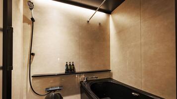 Separate bathtub and shower, free toiletries, hair dryer, towels