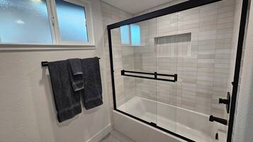 Hair dryer, towels, soap, toilet paper