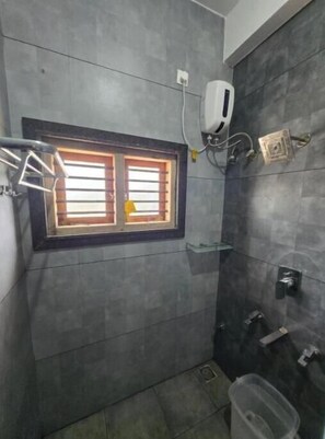 Shower, towels, soap, toilet paper