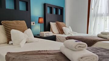 2 habitaciones, tabla de planchar con plancha y wifi gratis