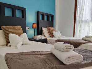 2 habitaciones, tabla de planchar con plancha y wifi gratis 