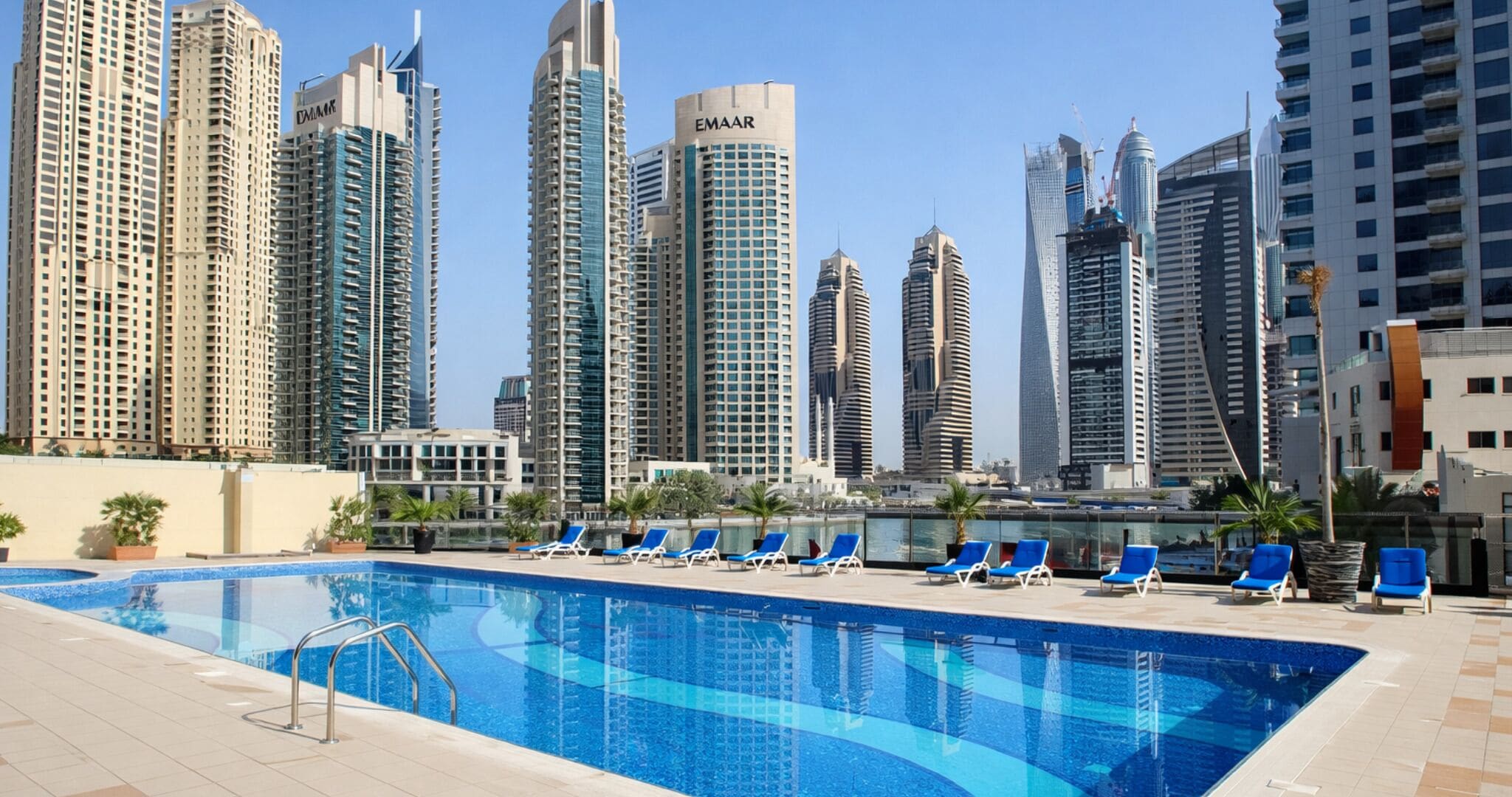 2 outdoor pools, open 8:00 AM to 10:00 PM, pool umbrellas
