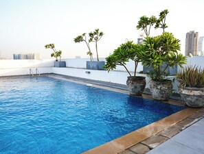 Apartment, Balcony, City View | Pool | Outdoor pool - Bright Studio with Rooftop Pool & Gym (Dubai)