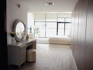 Apartment, Balcony, City View | Interior - Bright Studio with Rooftop Pool & Gym (Dubai)