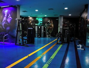 Apartment, Balcony, City View | Fitness facility - Bright Studio with Rooftop Pool & Gym (Dubai)