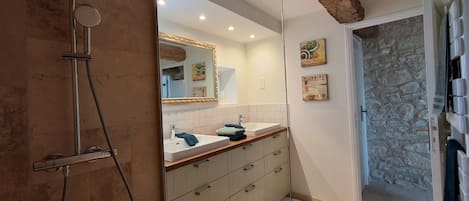 Shower, hair dryer, towels, soap