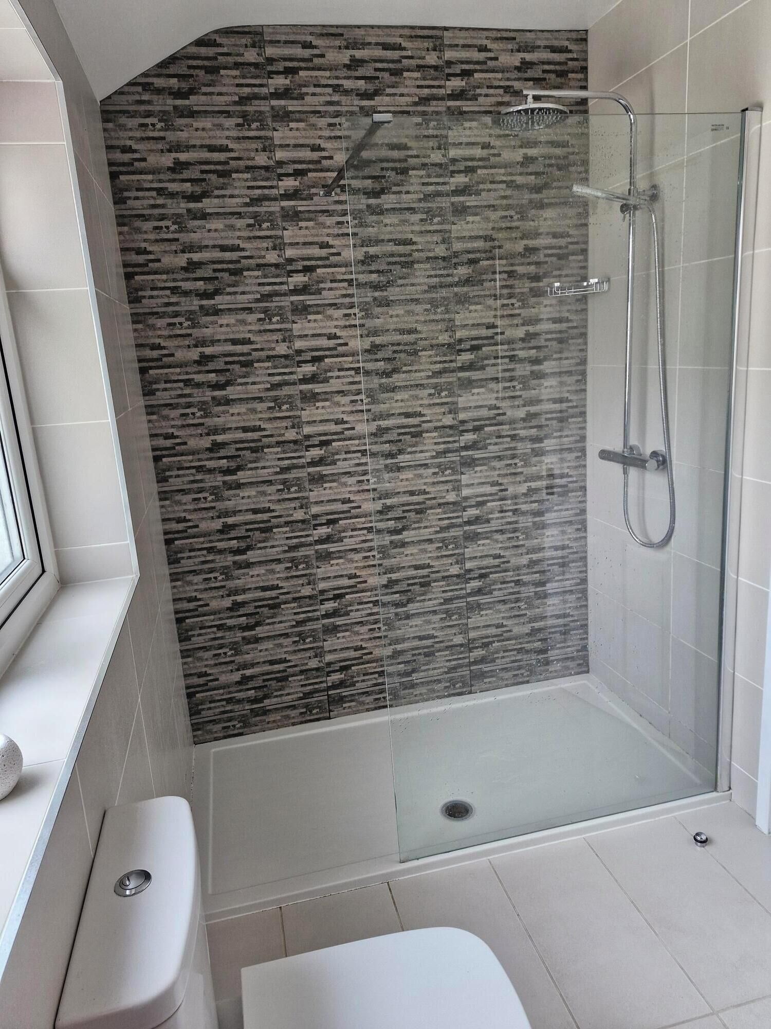 Shower, towels, soap, toilet paper