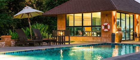 Outdoor pool, pool umbrellas, pool loungers