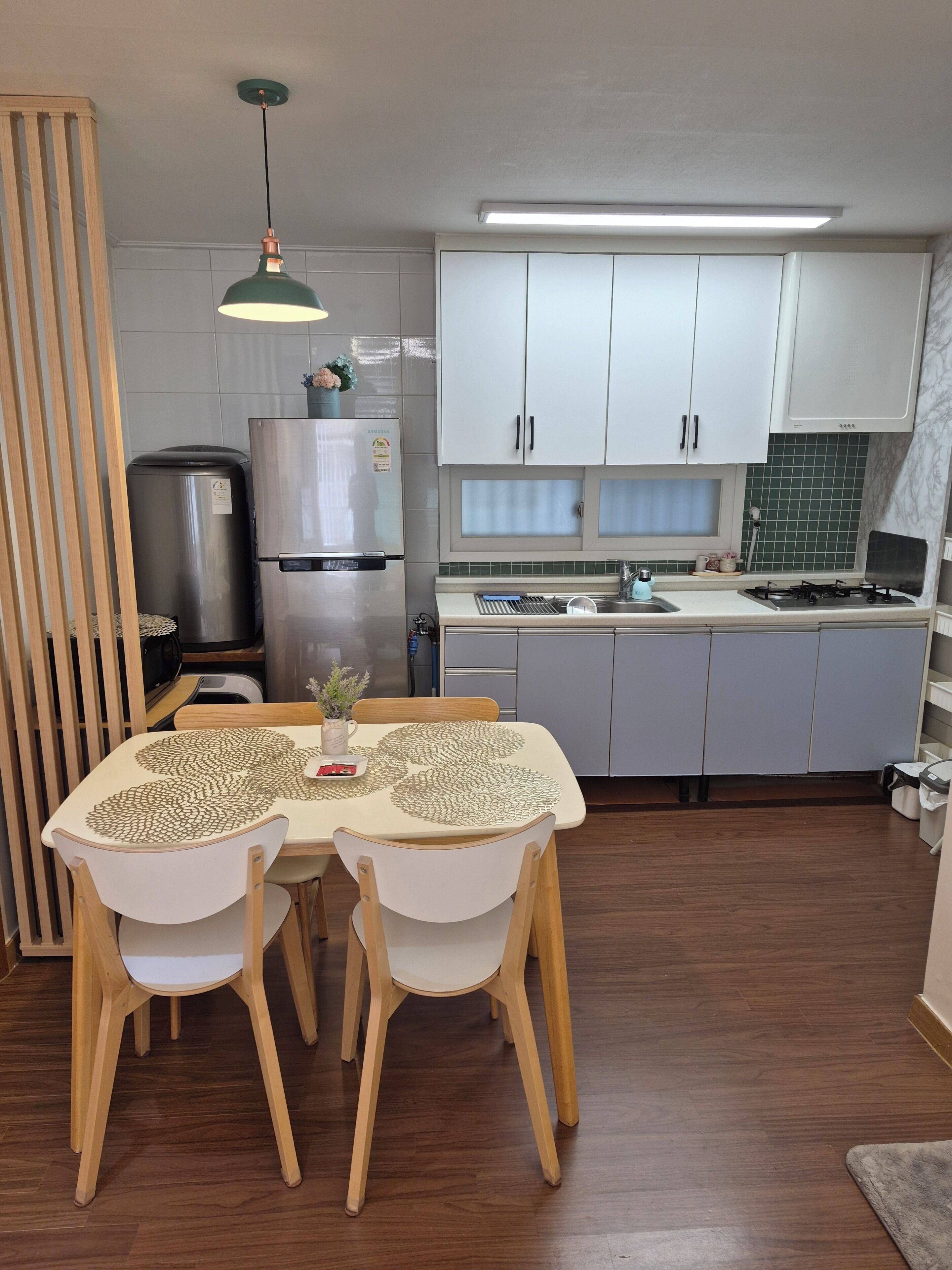 Full-sized fridge, rice cooker, cookware/dishes/utensils, spices
