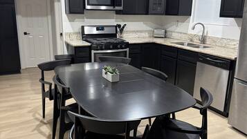 Coffee/tea maker, fridge, microwave, oven