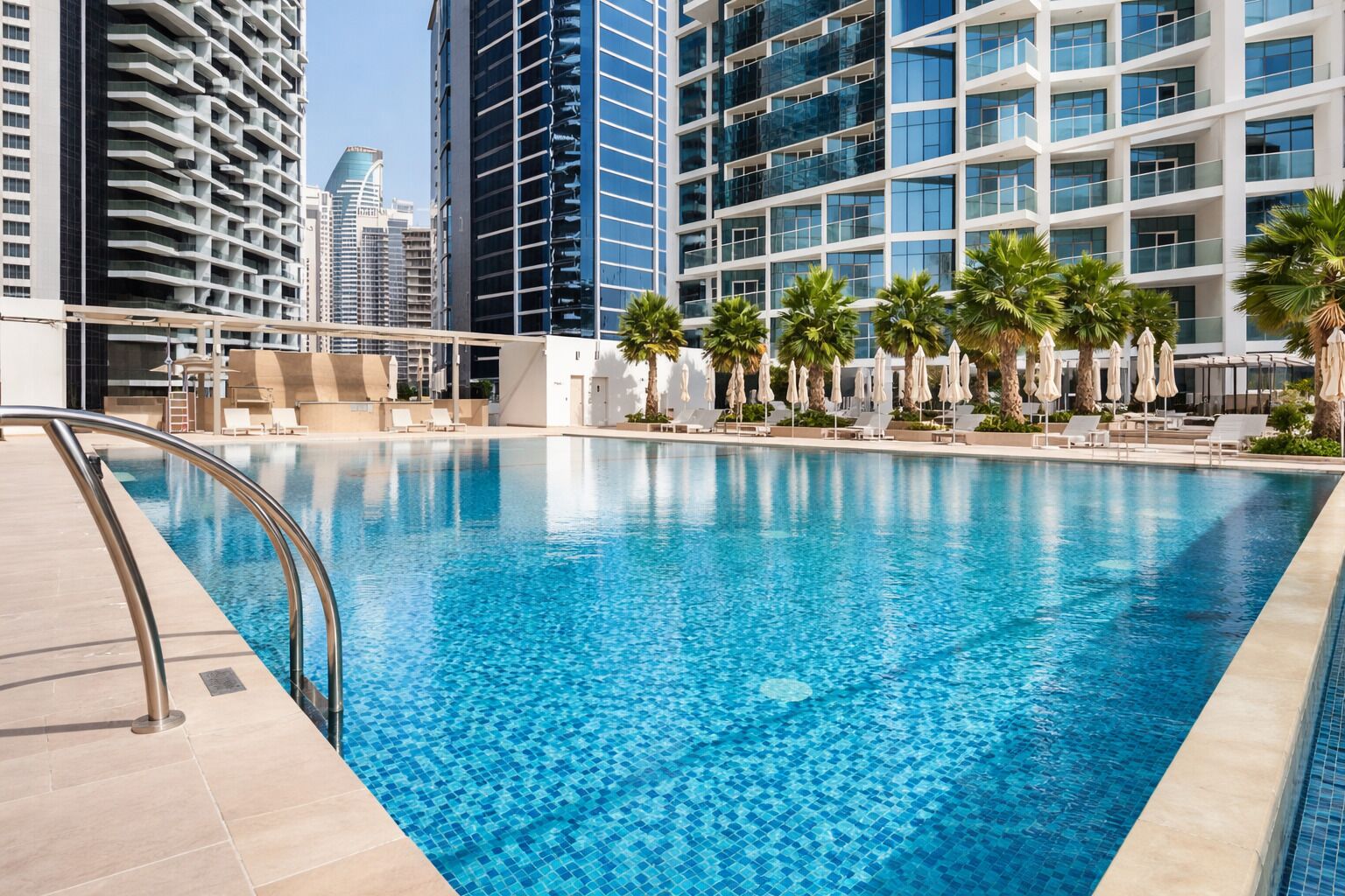 2 outdoor pools, open 8:00 AM to 10:00 PM, pool umbrellas, sun loungers