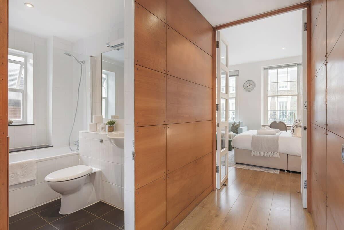 Shower, hair dryer, towels, shampoo
