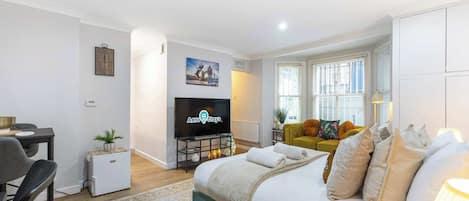 Desk, iron/ironing board, travel crib, WiFi
