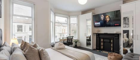 Desk, iron/ironing board, travel crib, WiFi