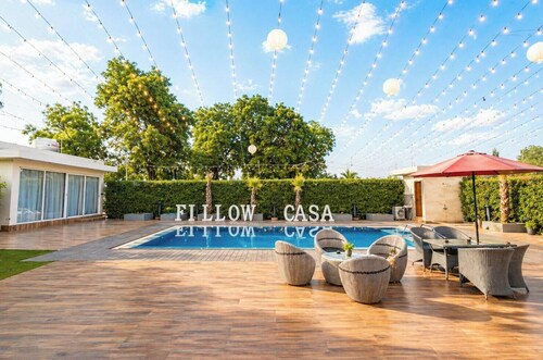 Spacious 5-bedroom farmhouse in tranquil Gurugram with AC