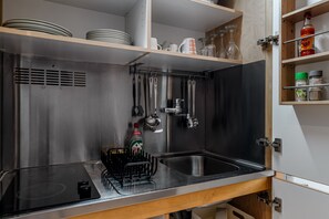 Fridge, microwave, stovetop, coffee/tea maker
