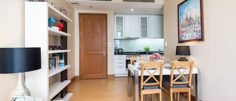 Fridge, microwave, stovetop, coffee/tea maker