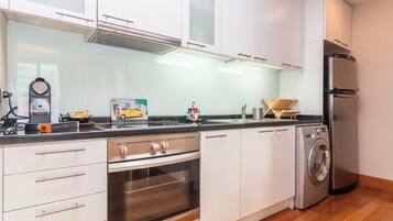 Fridge, microwave, stovetop, coffee/tea maker