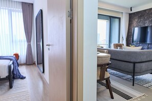 Apartamento, 1 quarto, vista para a cidade | Área de estar