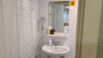 Hair dryer, towels, toilet paper