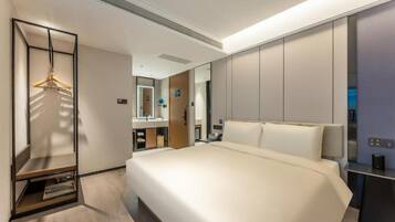 Superior Double Room, City View | Free minibar, desk, laptop workspace, blackout curtains