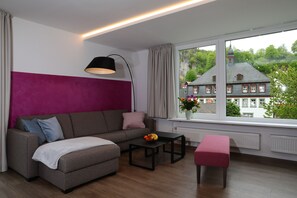 Deluxe Suite, Mountain View | Living area | Toys - Aparthotel Minderlein  (Pottenstein)