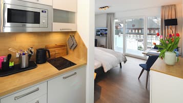 Junior Suite, Balcony, Mountain View | Private kitchen | Highchair