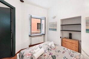 2 dormitorios, tabla de planchar con plancha, wifi y ropa de cama