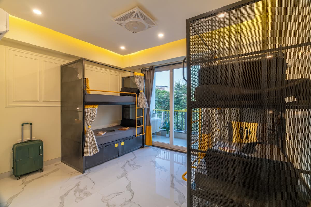 Bed in 4 Bed Mixed Dormitory with Balcony and City View | Blackout drapes, WiFi (free), bed sheets