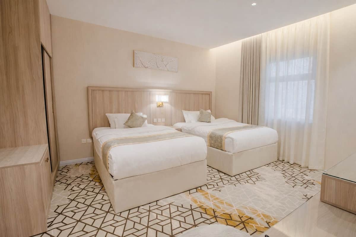 Junior Suite, Multiple Beds | In-room safe, soundproofing, iron/ironing board, free WiFi