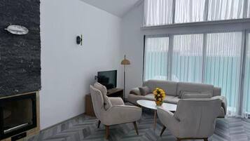 Bungalow Exclusive, vista montagna | Area soggiorno