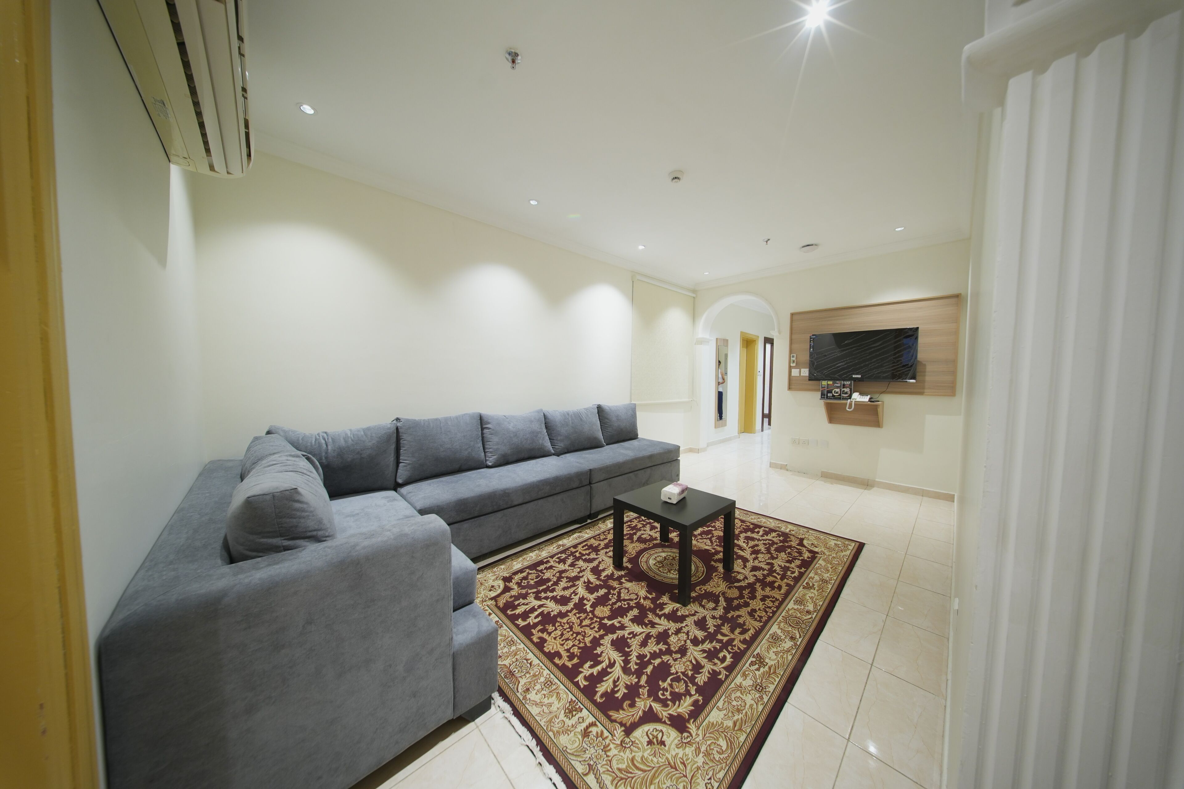 Apartamento, 3 quartos | Área de estar