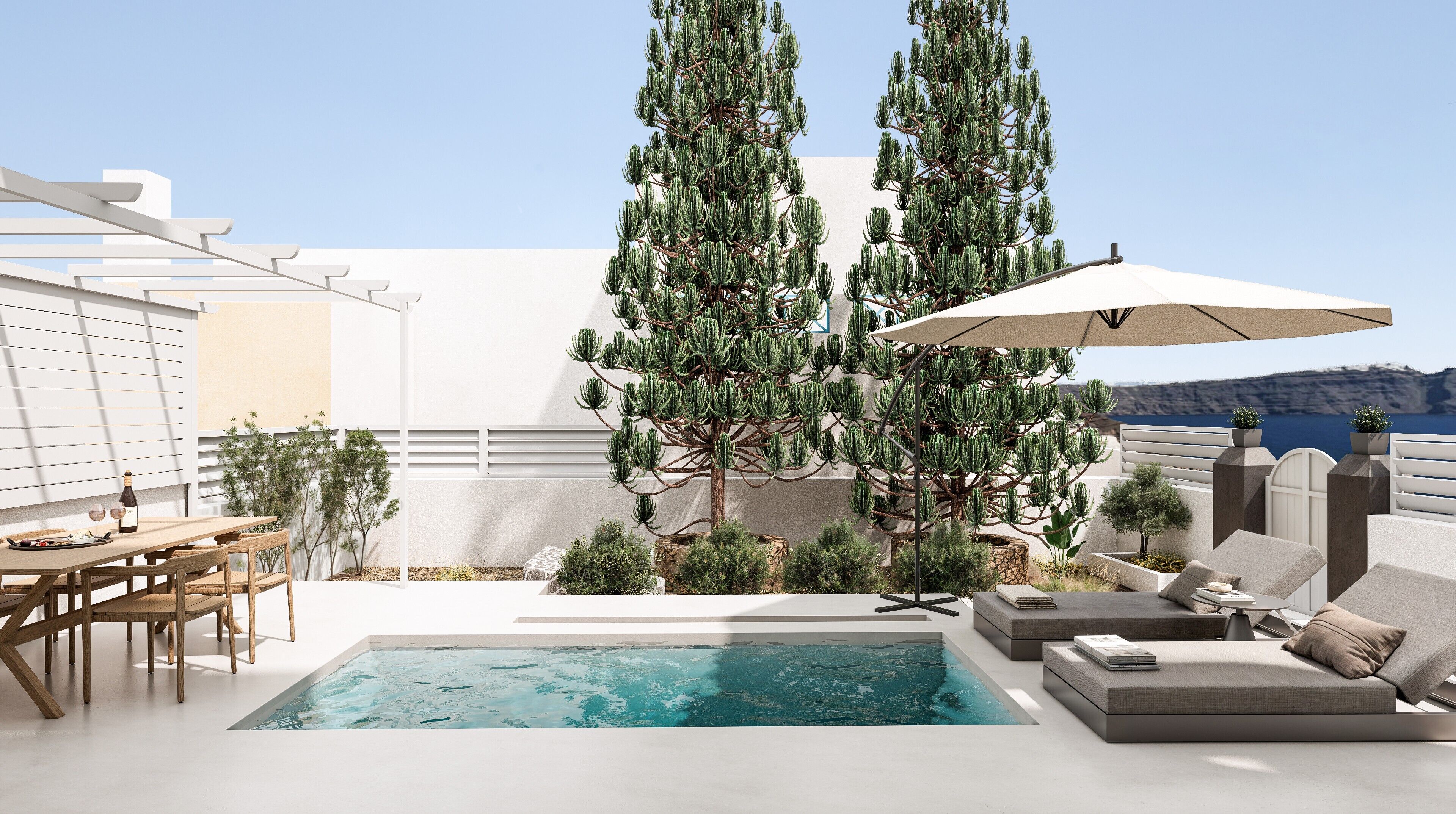 A modern outdoor pool area with seating and a view of the sea.