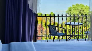 Premium bedding, pillow-top beds, minibar, blackout curtains