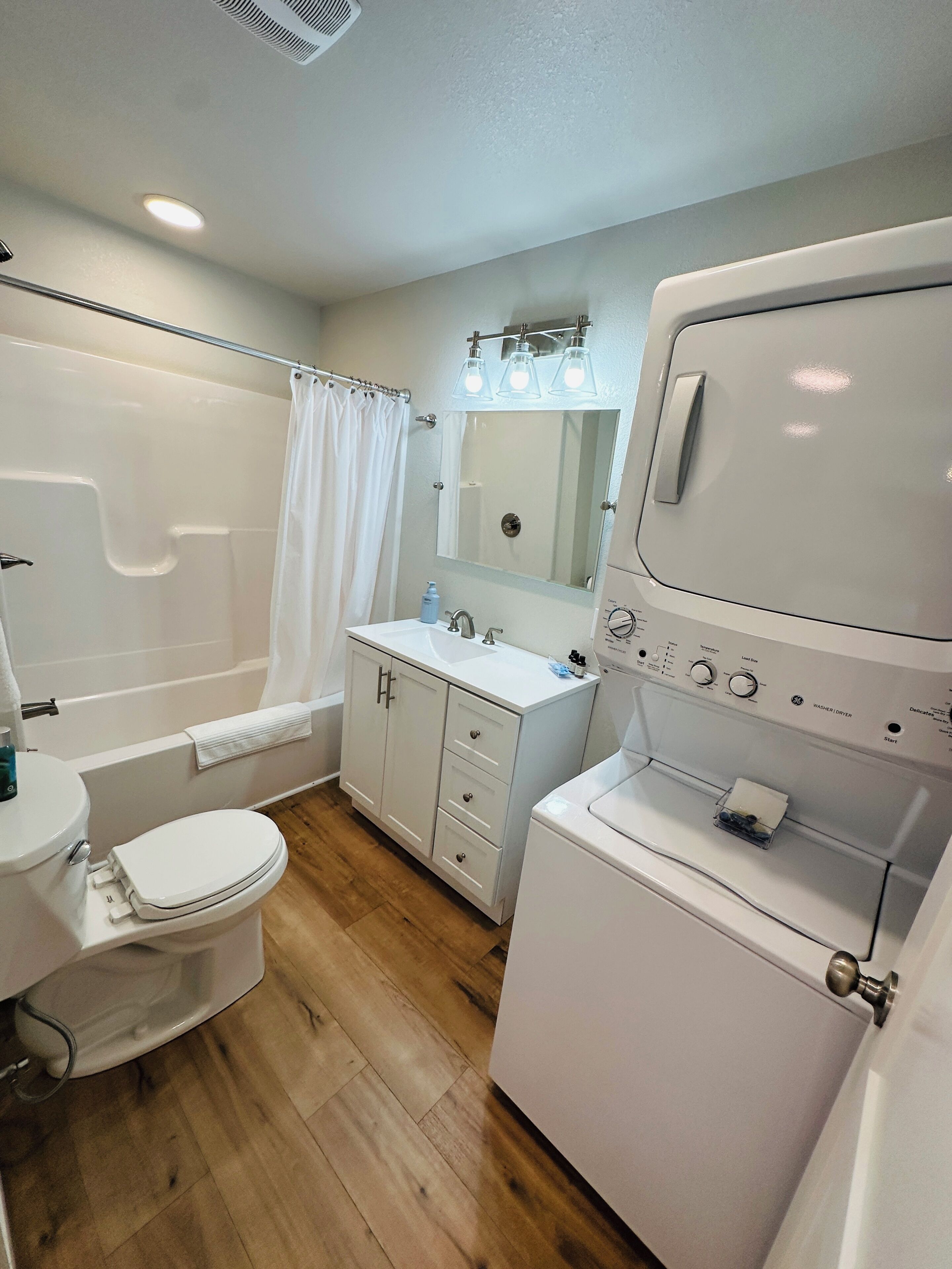 Hair dryer, towels, soap, toilet paper