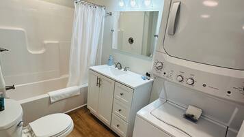 Hair dryer, towels, soap, toilet paper
