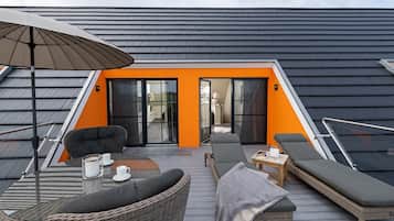 Family Apartment, Balcony, Sea View | Outdoor dining