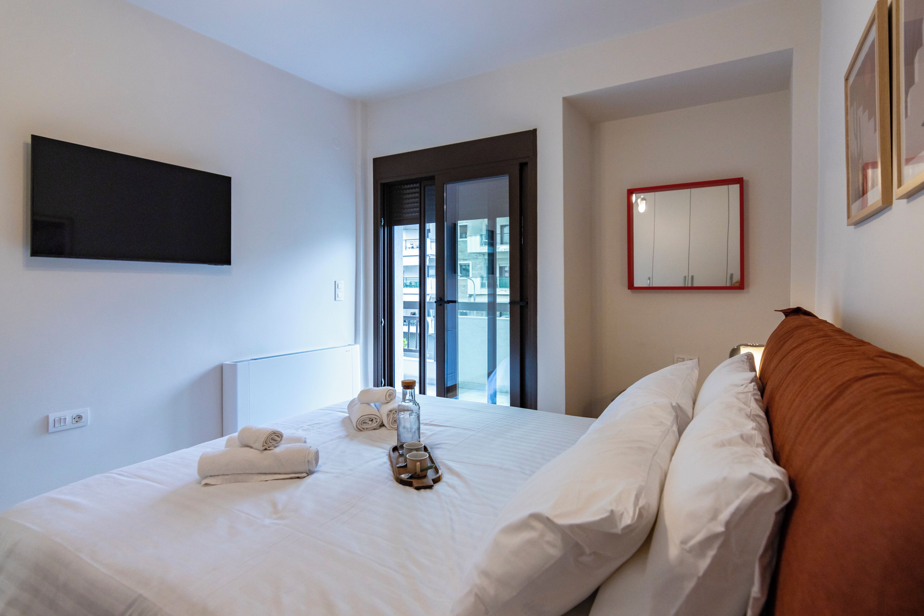 2 dormitorios, tabla de planchar con plancha, wifi gratis y ropa de cama