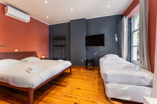 Room with view on old city square The Lake Suites