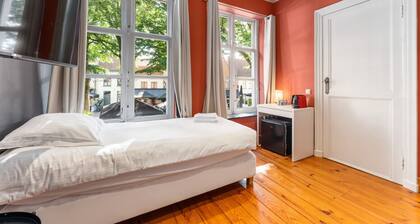 Room with view on old city square The Lake Suites